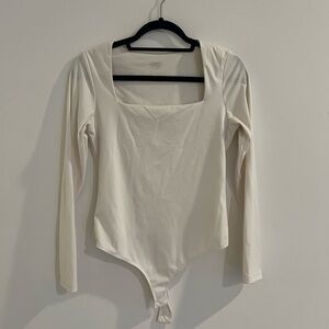 Elegant Cream Long Sleeve Bodysuit